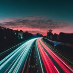 timelapse photography of vehicles at night